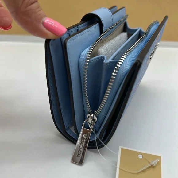 Michael Kors Jet Set Travel Medium Printed Signature Logo Bi-Fold Wallet
LT SKY - Picture 11 of 15